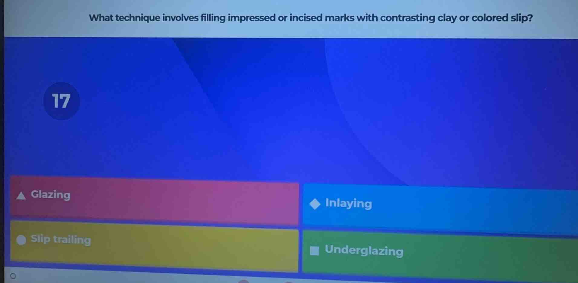 what technique involves filling impressed or incised marks with contras…