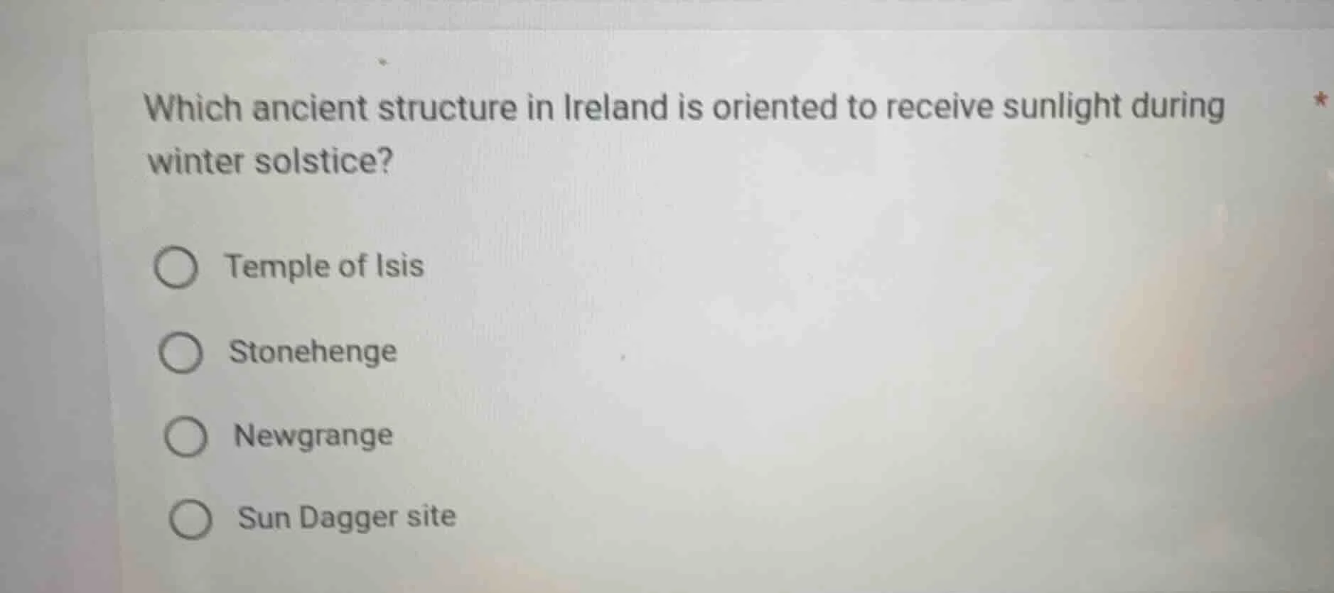 which ancient structure in ireland is oriented to receive sunlight duri…
