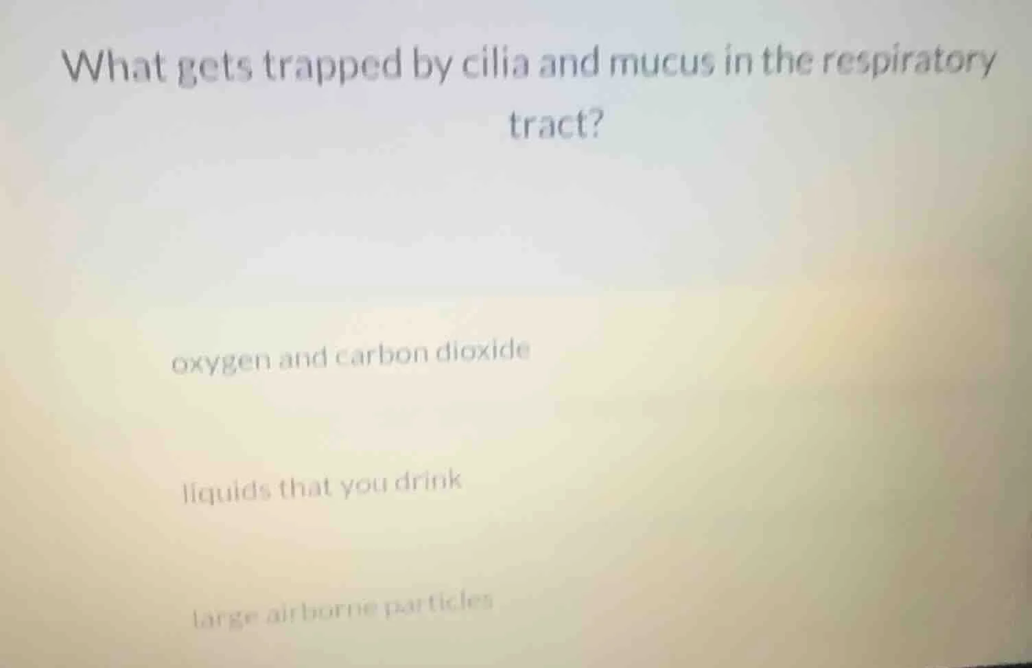 what gets trapped by cilia and mucus in the respiratory tract? oxygen a…