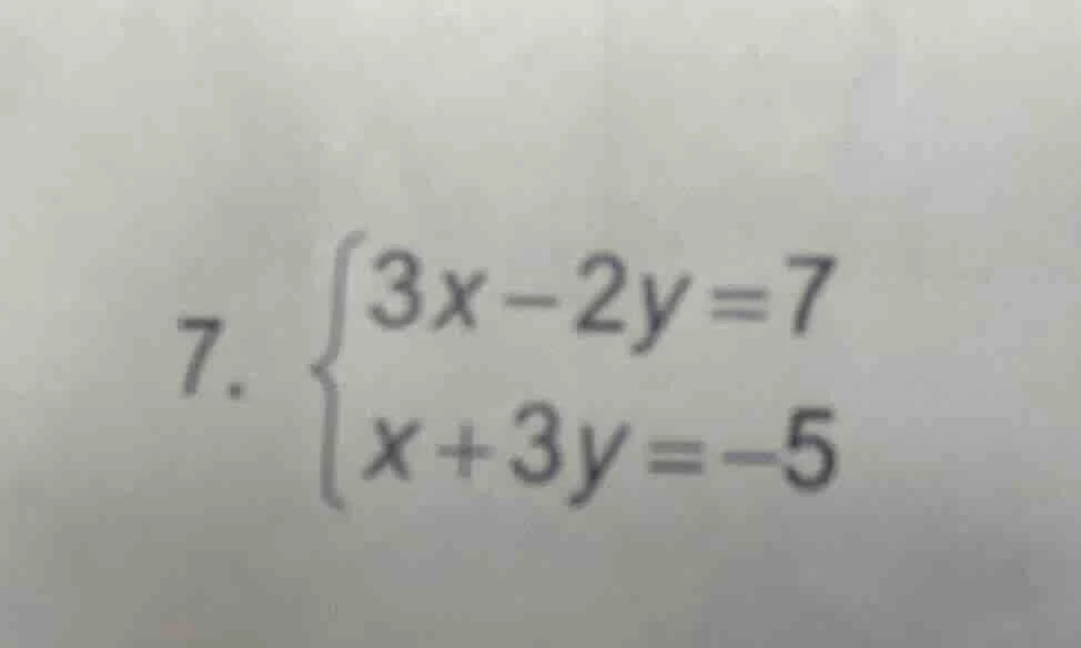 7. \\begin{cases} 3x - 2y = 7 \\\\ x + 3y = -5 \\end{cases}