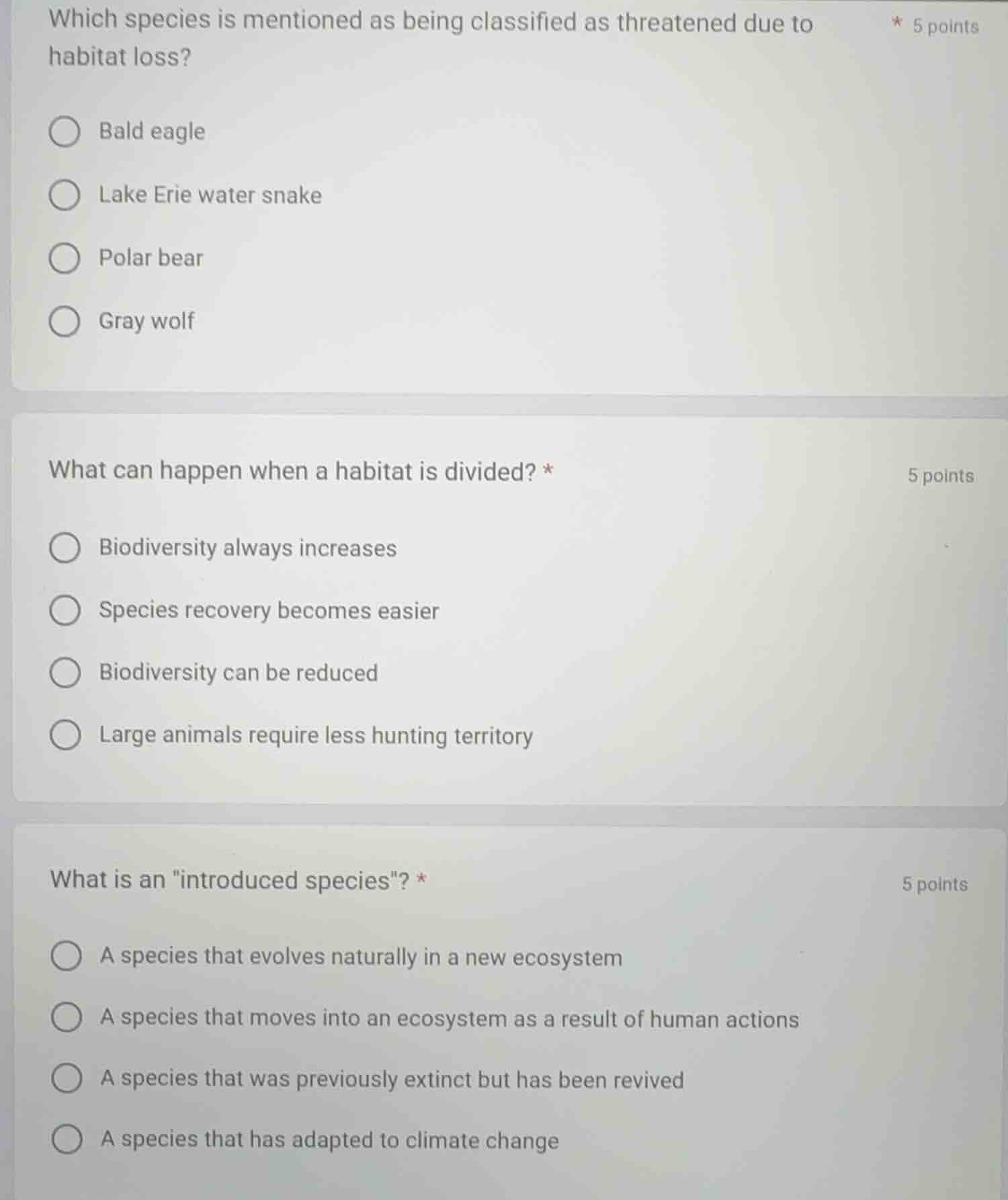 which species is mentioned as being classified as threatened due to hab…