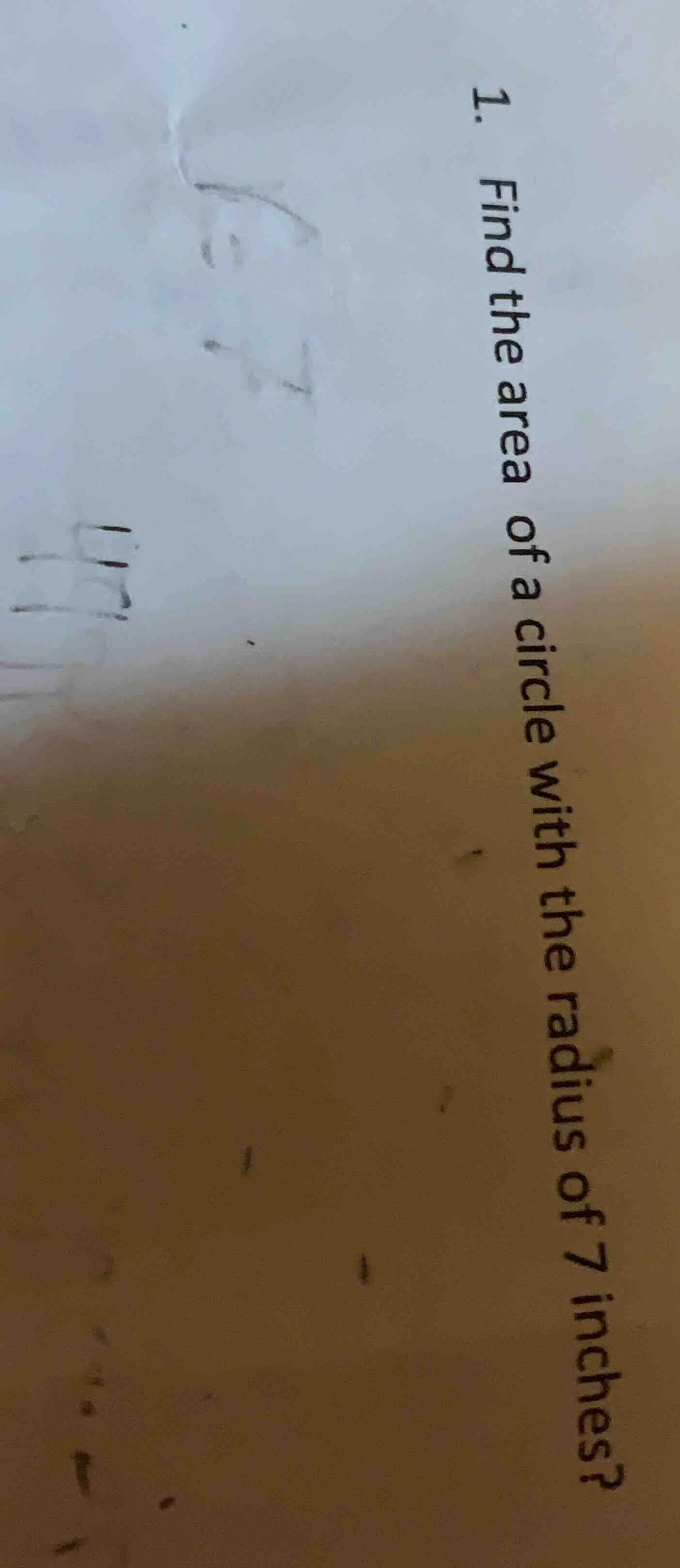 1. find the area of a circle with the radius of 7 inches?