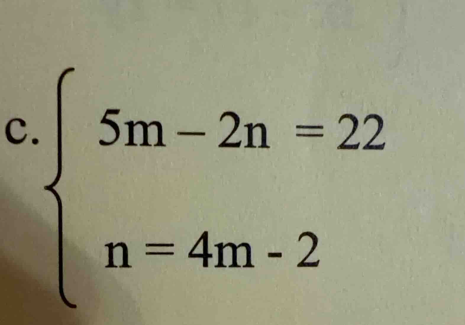 c. \\begin{cases} 5m - 2n = 22 \\\\ n = 4m - 2 \\end{cases}