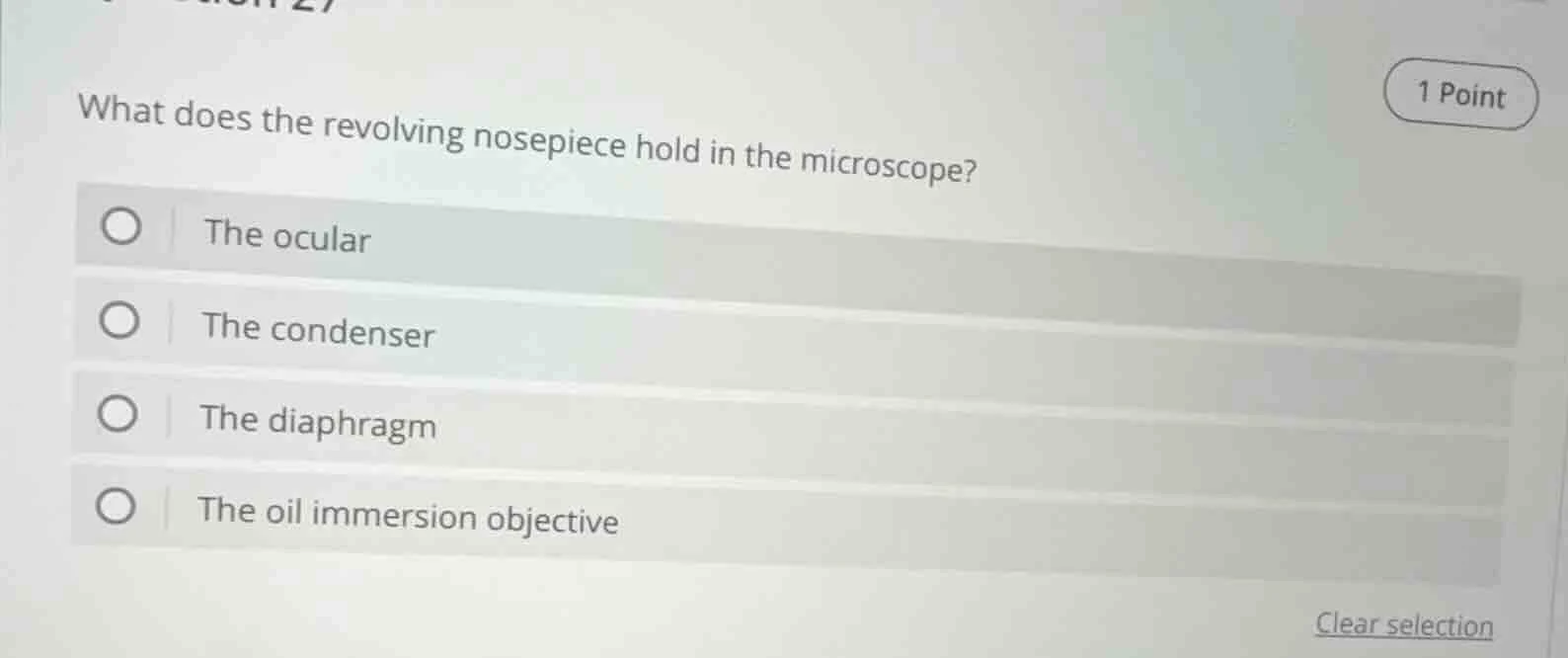 what does the revolving nosepiece hold in the microscope? the ocular th…