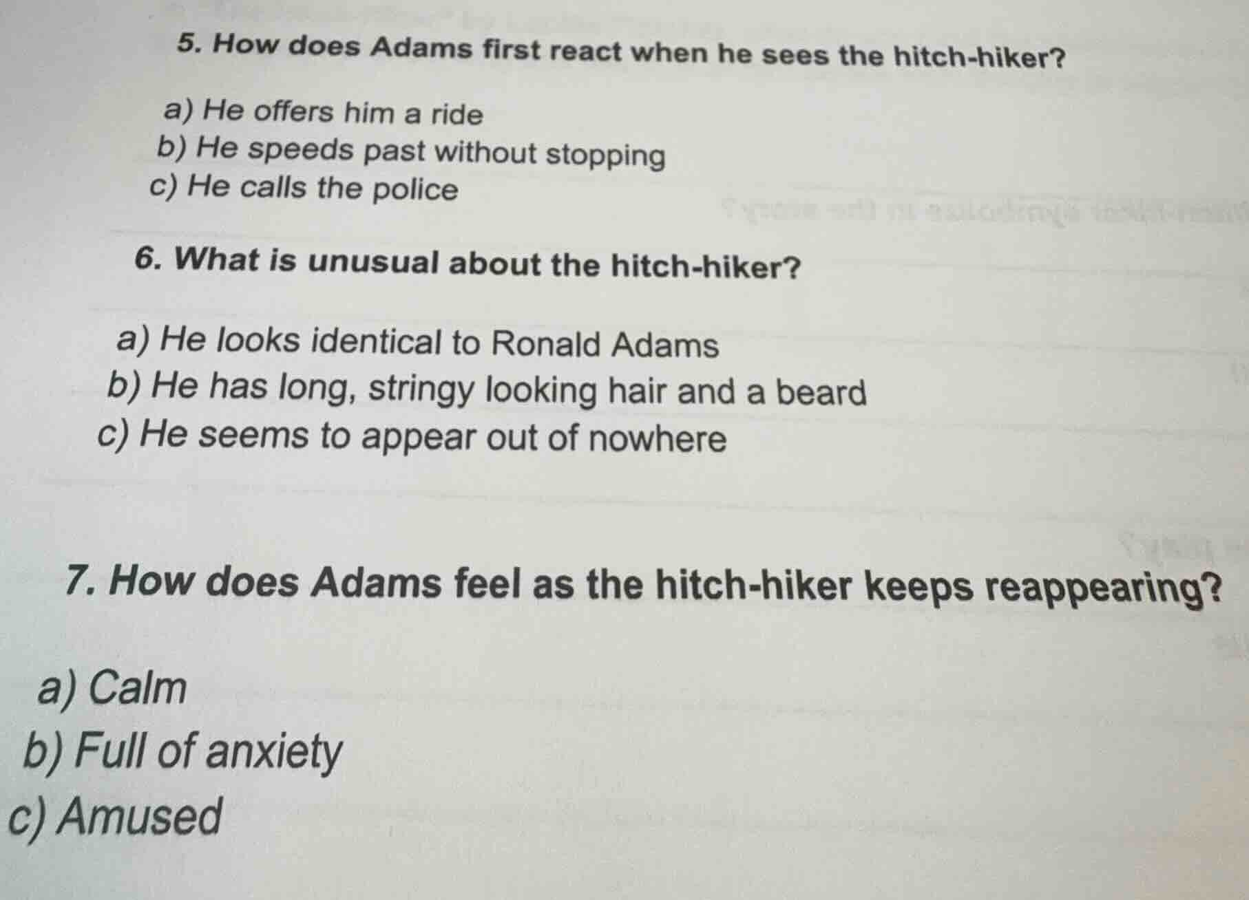 5. how does adams first react when he sees the hitch - hiker? a) he off…