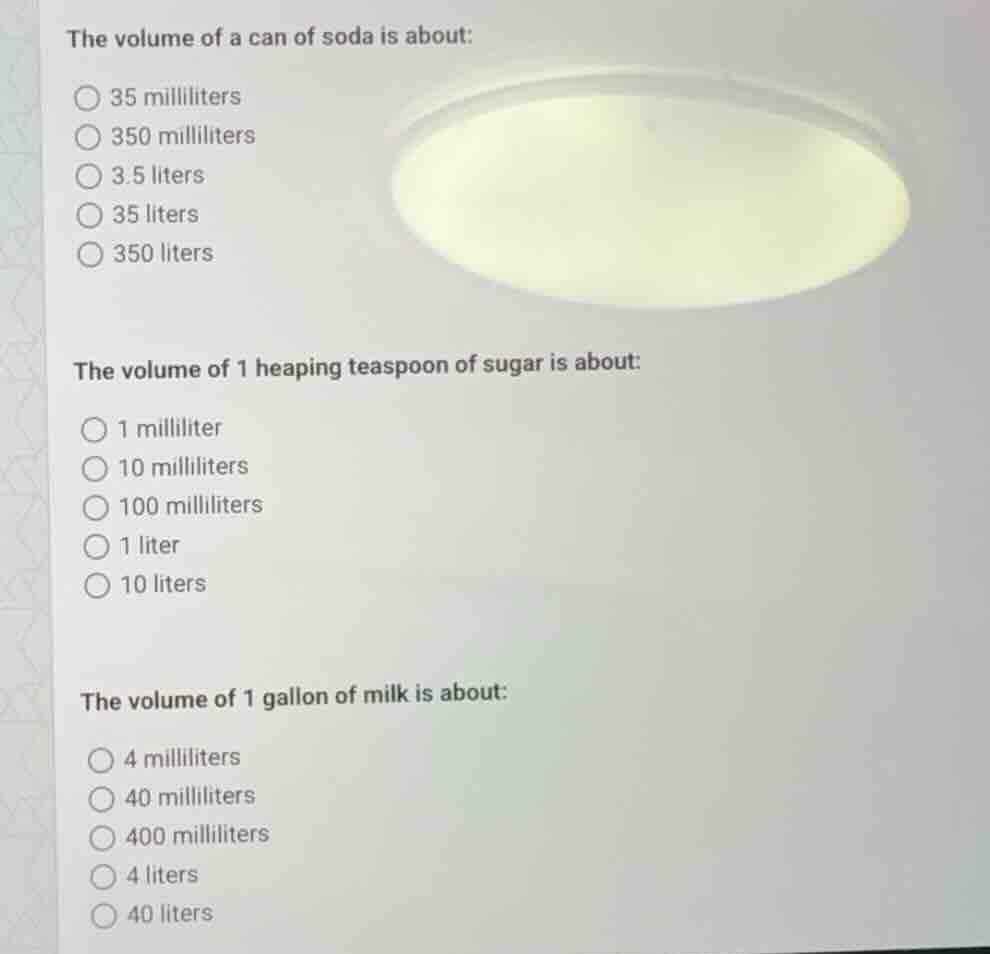 the volume of a can of soda is about: 35 milliliters 350 milliliters 3.…