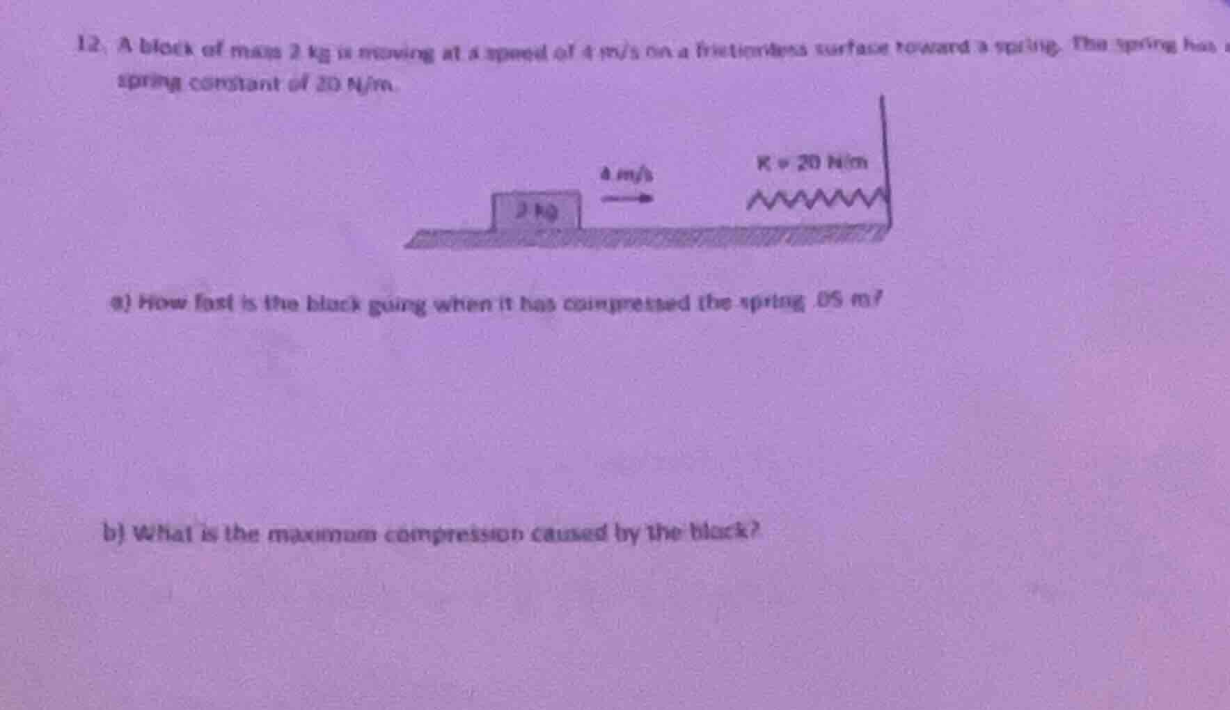 12. a block of mass 2 kg is moving at a speed of 4 m/s on a frictionles…