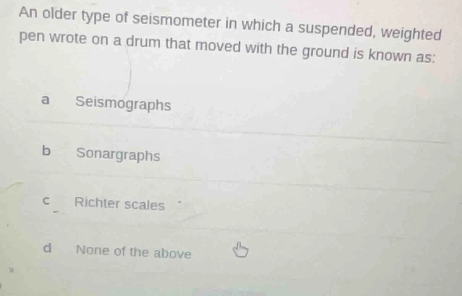an older type of seismometer in which a suspended, weighted pen wrote o…