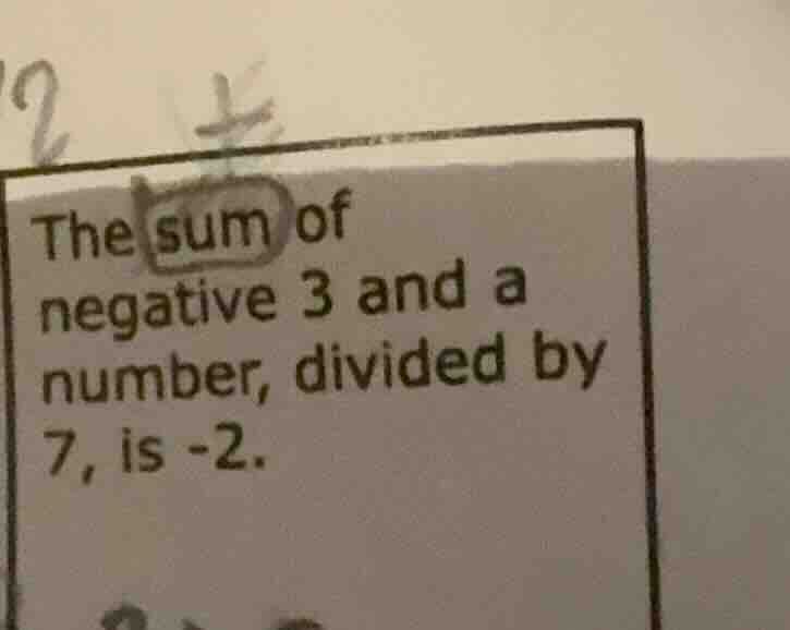 the sum of negative 3 and a number, divided by 7, is -2.