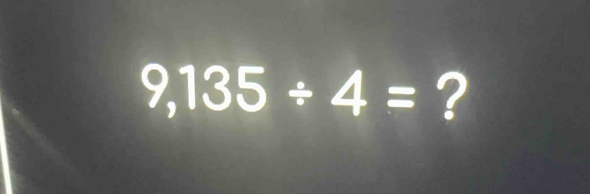 9,135 ÷ 4 = ?