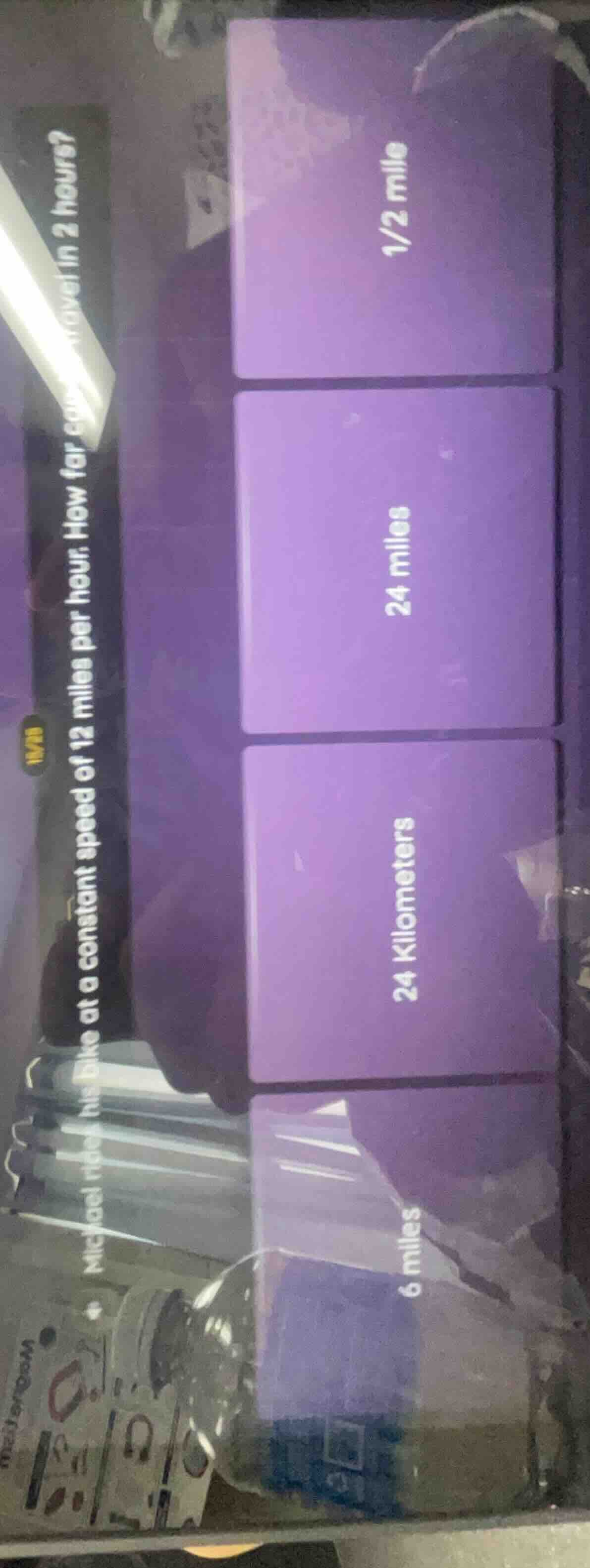 michael rides his bike at a constant speed of 12 miles per hour. how fa…