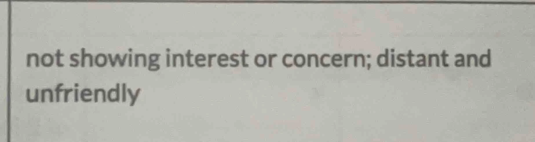 not showing interest or concern; distant and unfriendly