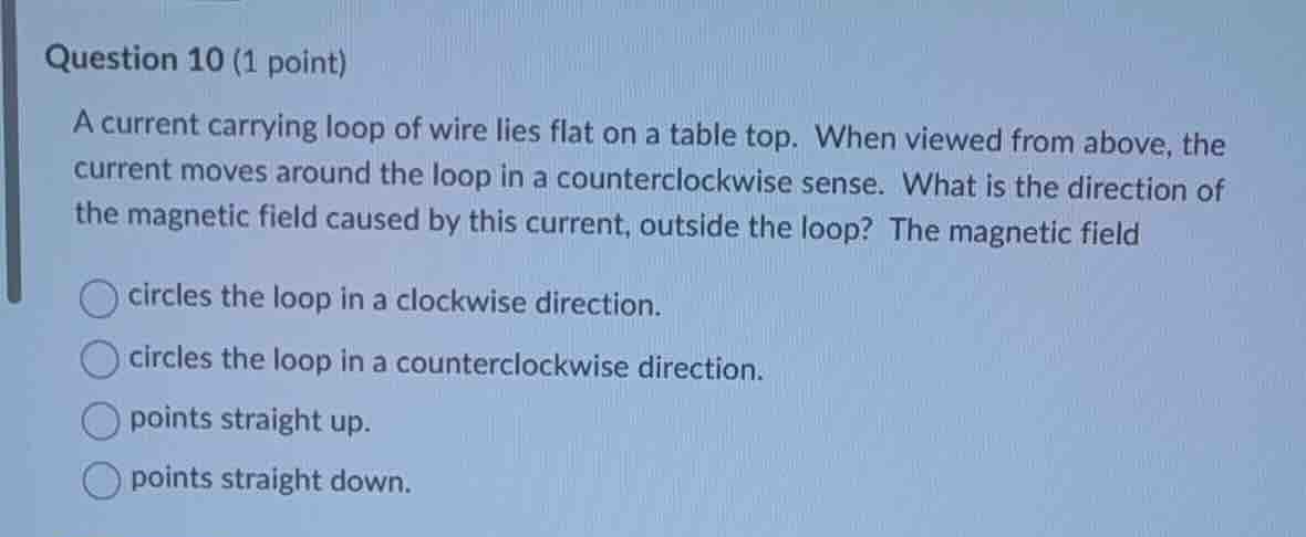 question 10 (1 point) a current carrying loop of wire lies flat on a ta…