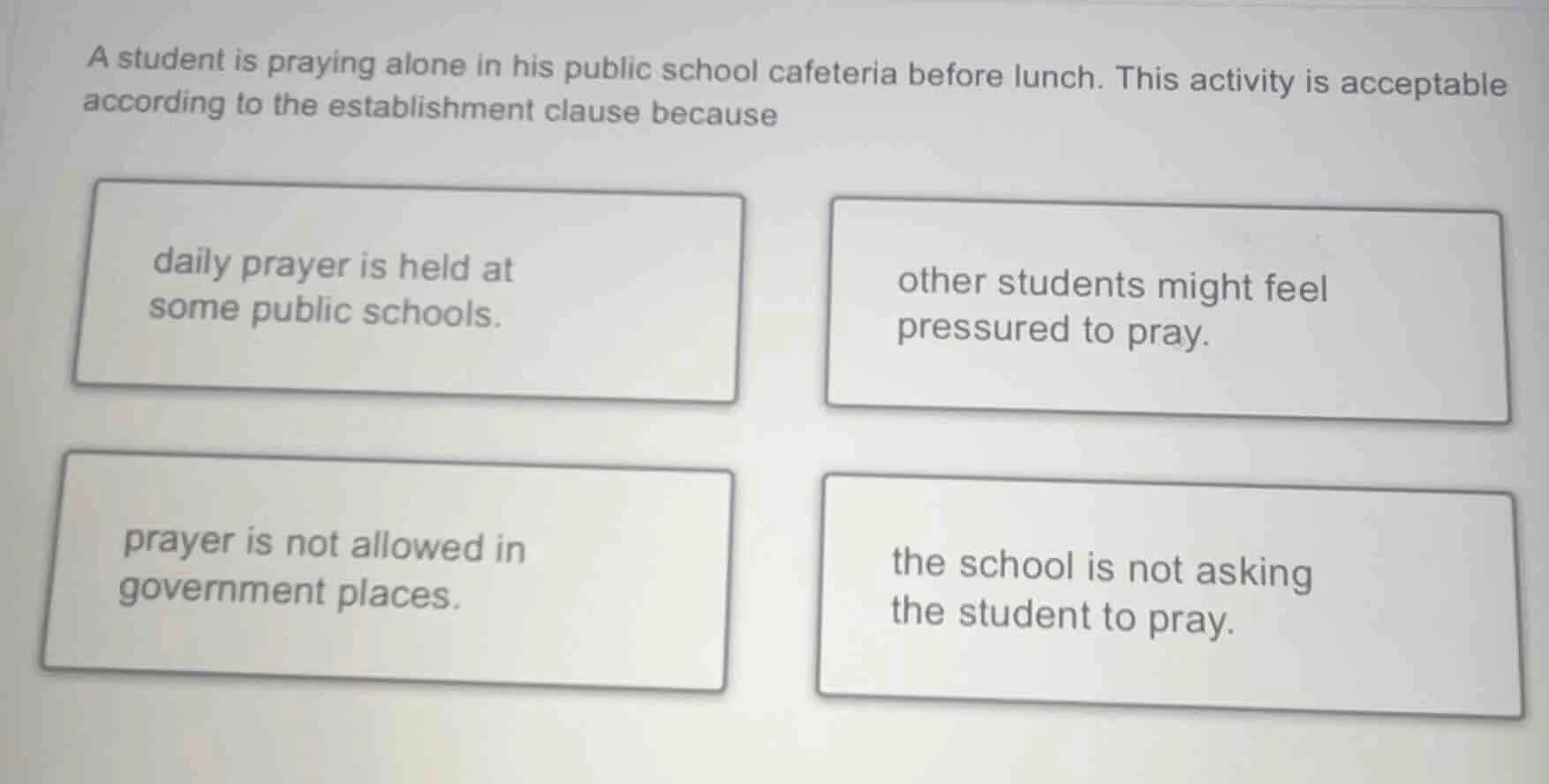a student is praying alone in his public school cafeteria before lunch.…