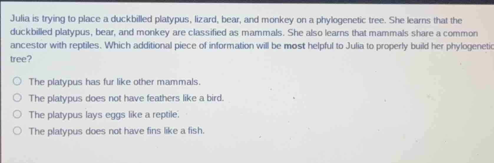 julia is trying to place a duckbilled platypus, lizard, bear, and monke…