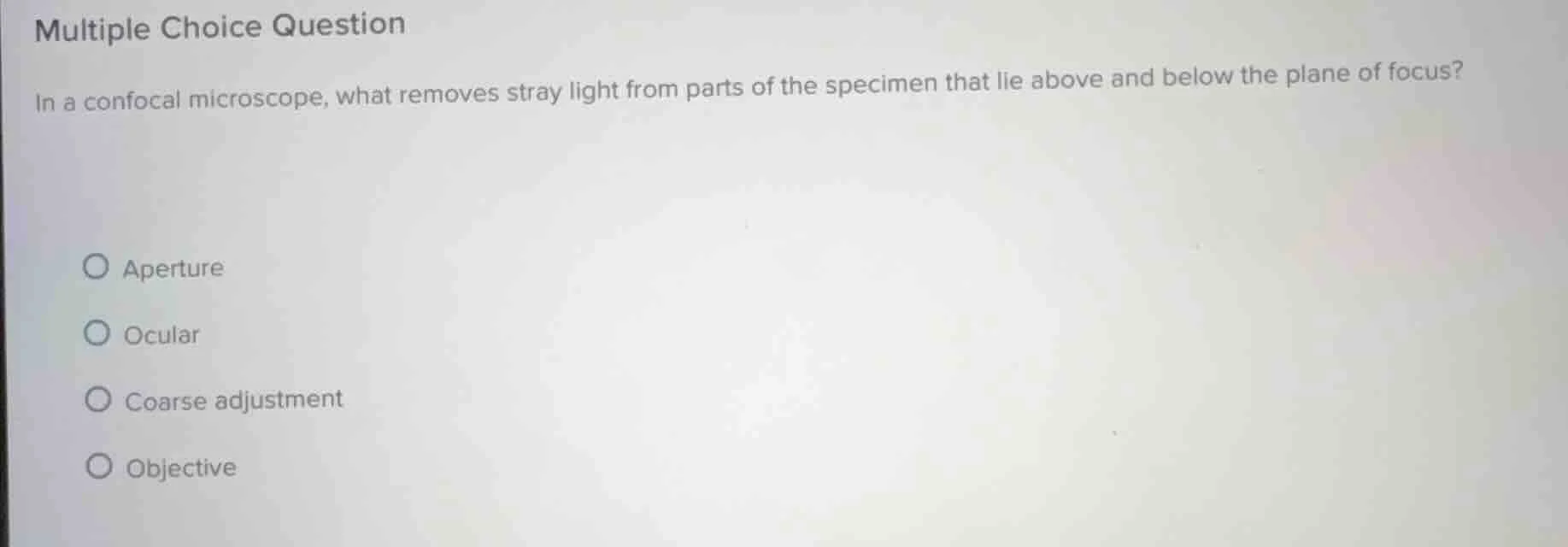 multiple choice question in a confocal microscope, what removes stray l…
