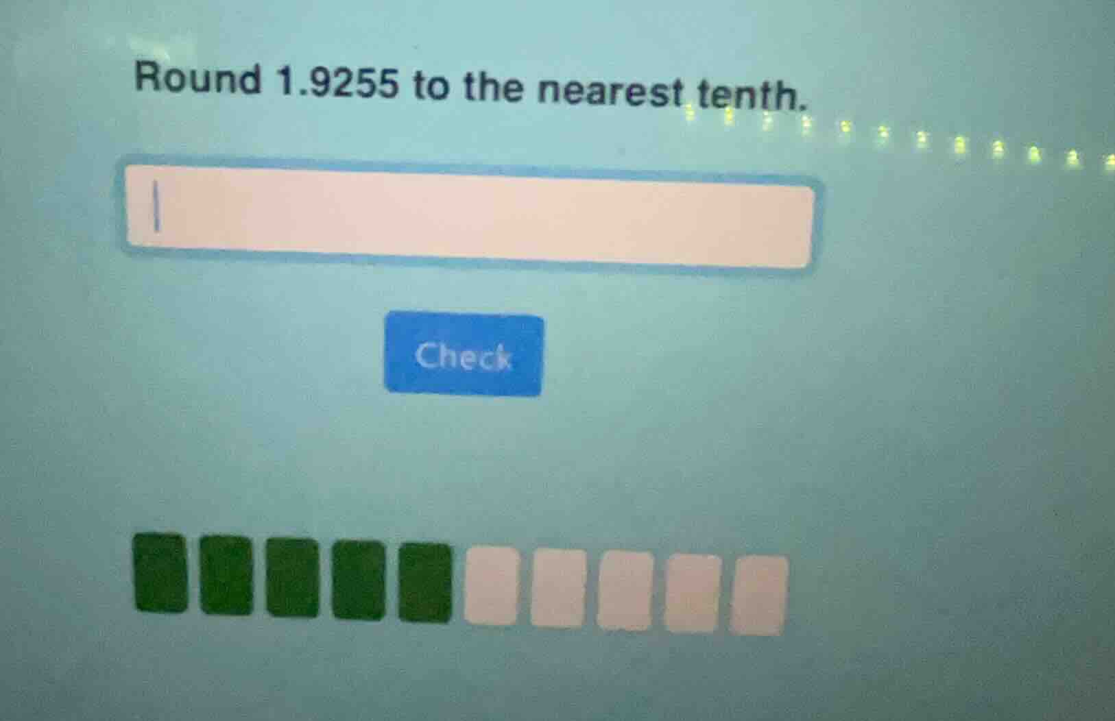 round 1.9255 to the nearest tenth.