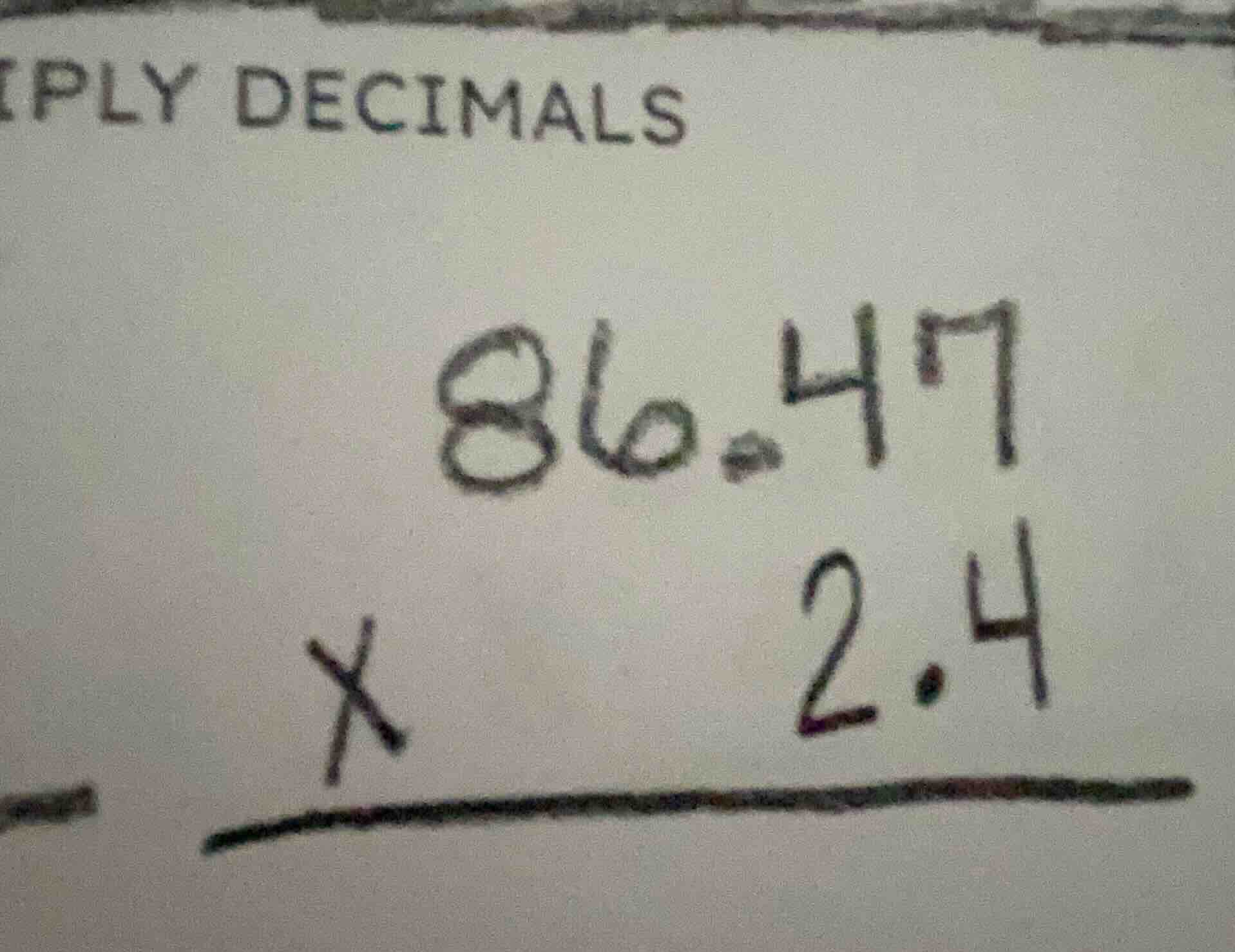 iply decimals 86.47 × 2.4