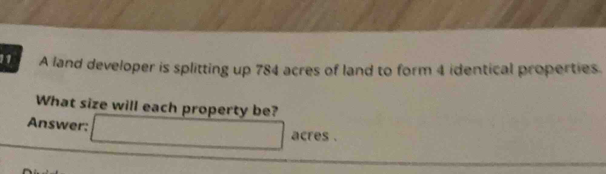 a land developer is splitting up 784 acres of land to form 4 identical …