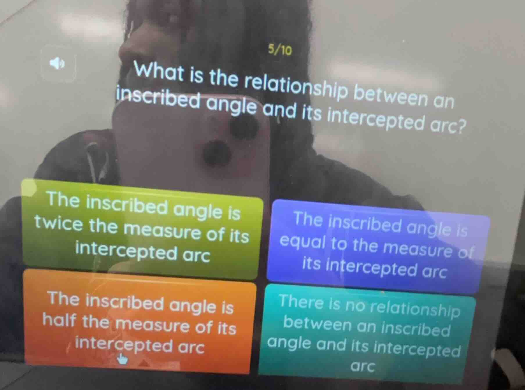 what is the relationship between an inscribed angle and its intercepted…