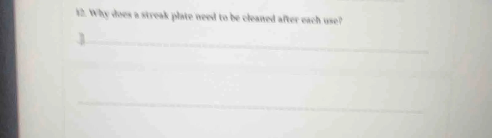 12. why does a streak plate need to be cleaned after each use?