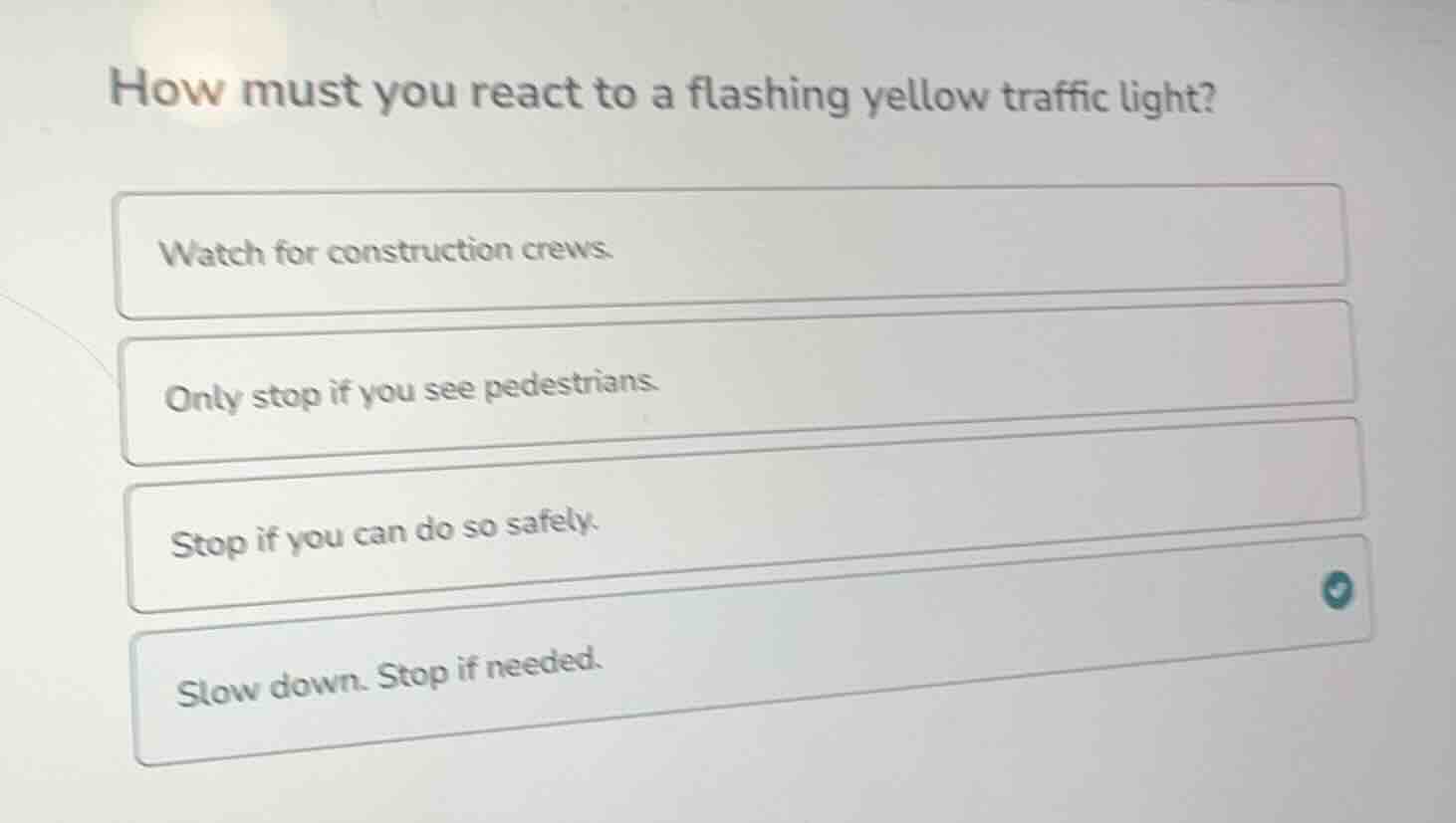 how must you react to a flashing yellow traffic light? watch for constr…