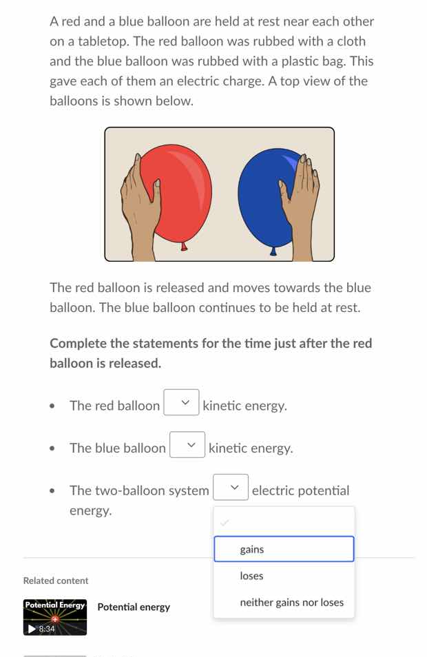 a red and a blue balloon are held at rest near each other on a tabletop…