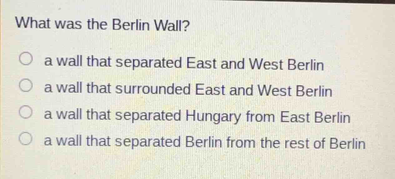 what was the berlin wall? a wall that separated east and west berlin a …