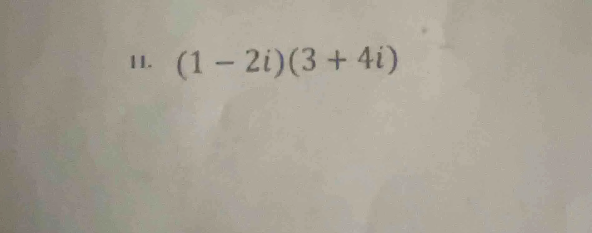 11. (1 - 2i)(3 + 4i)
