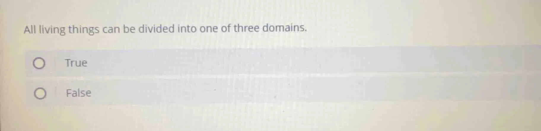all living things can be divided into one of three domains. true false