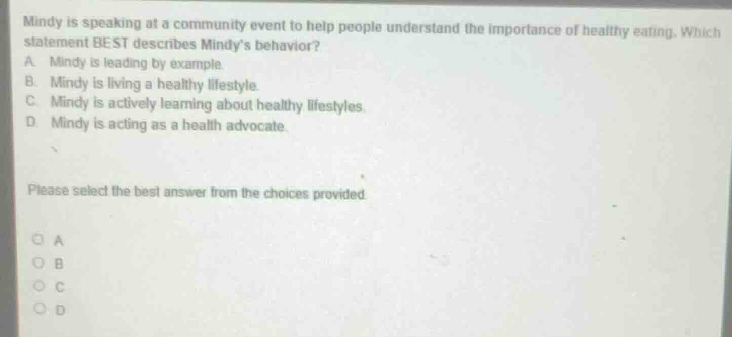 mindy is speaking at a community event to help people understand the im…