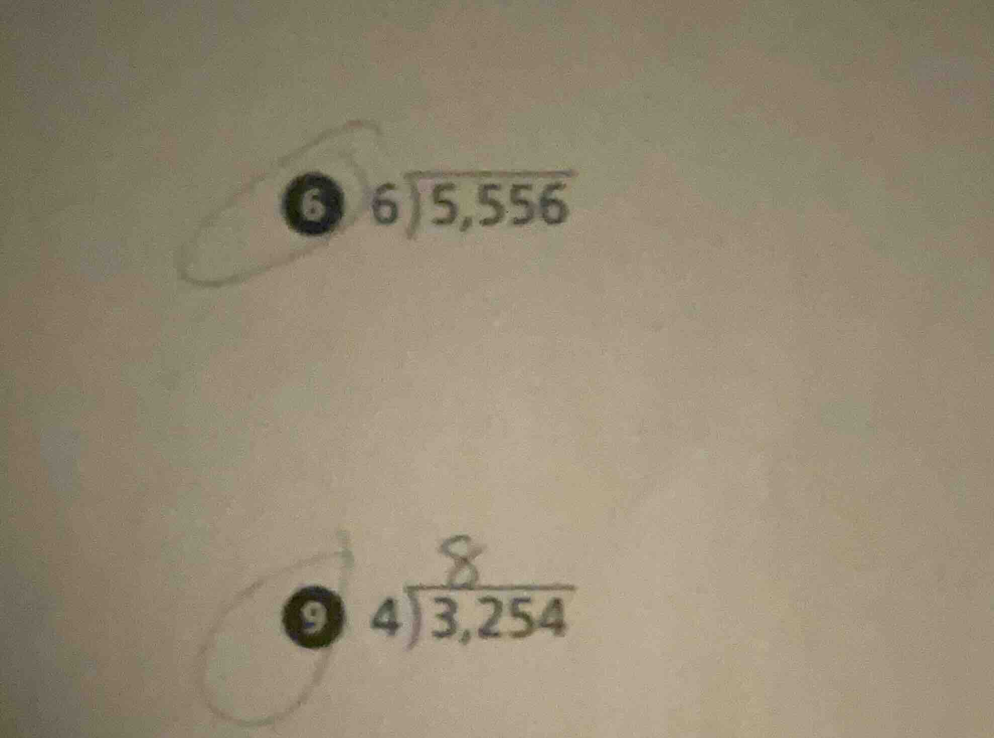 6) \\overline{6\\big)5,556} \ 9) \\overline{\\frac{8}{4\\big)3,254}}
