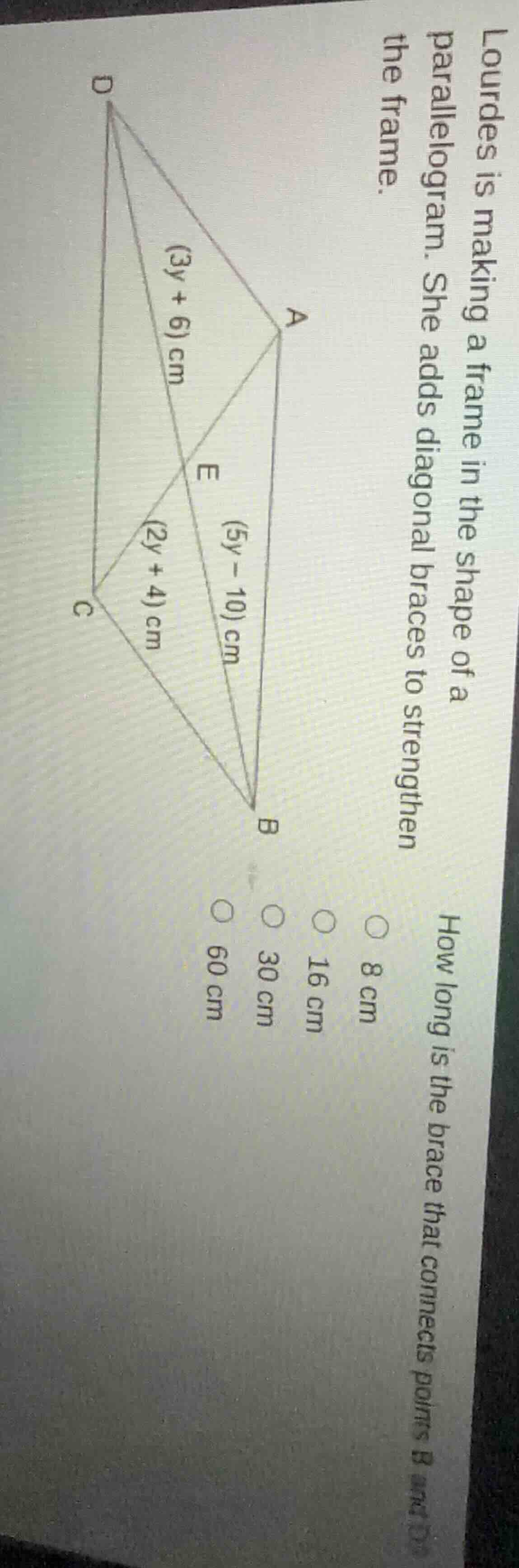 lourdes is making a frame in the shape of a parallelogram. she adds dia…