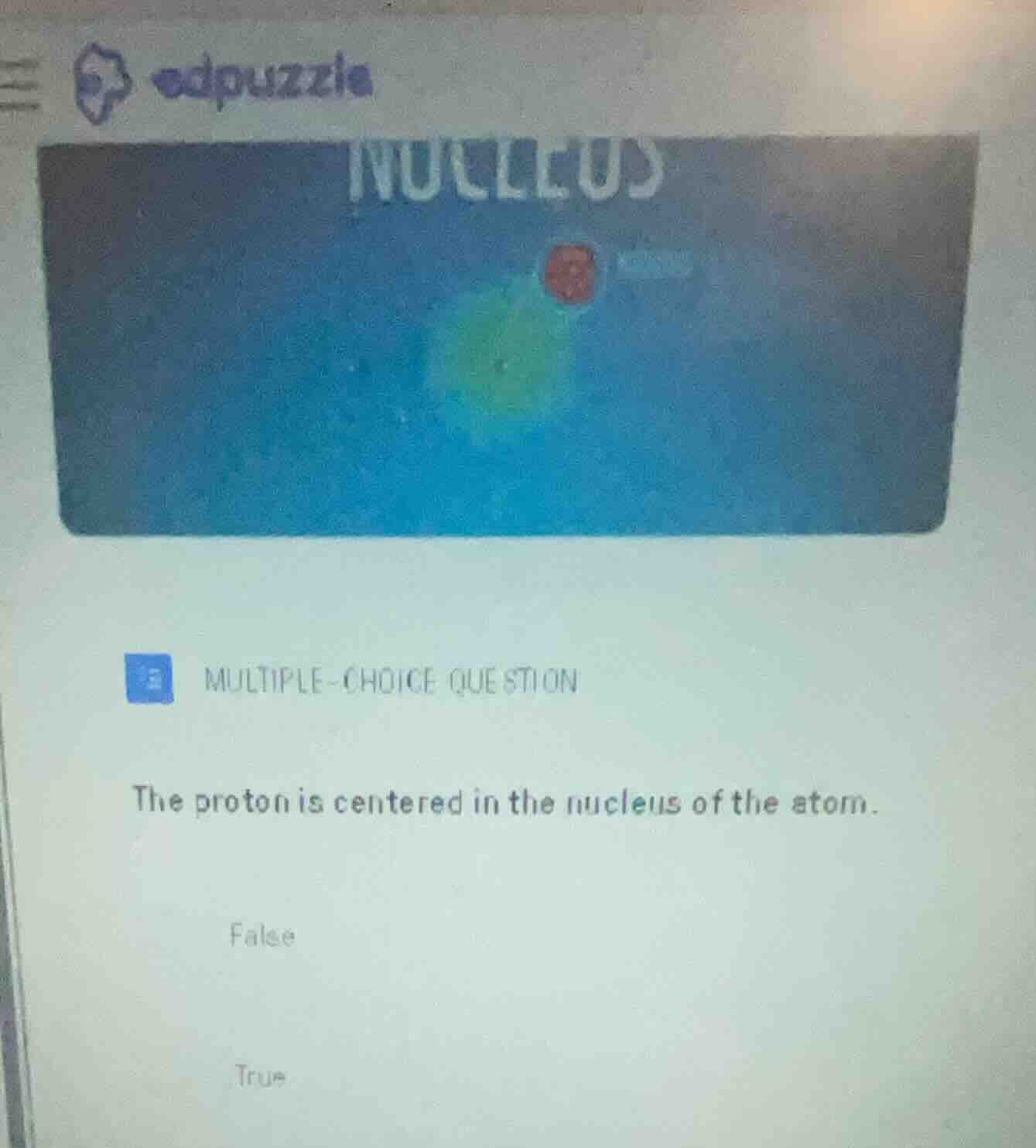 multiple-choice question the proton is centered in the nucleus of the a…
