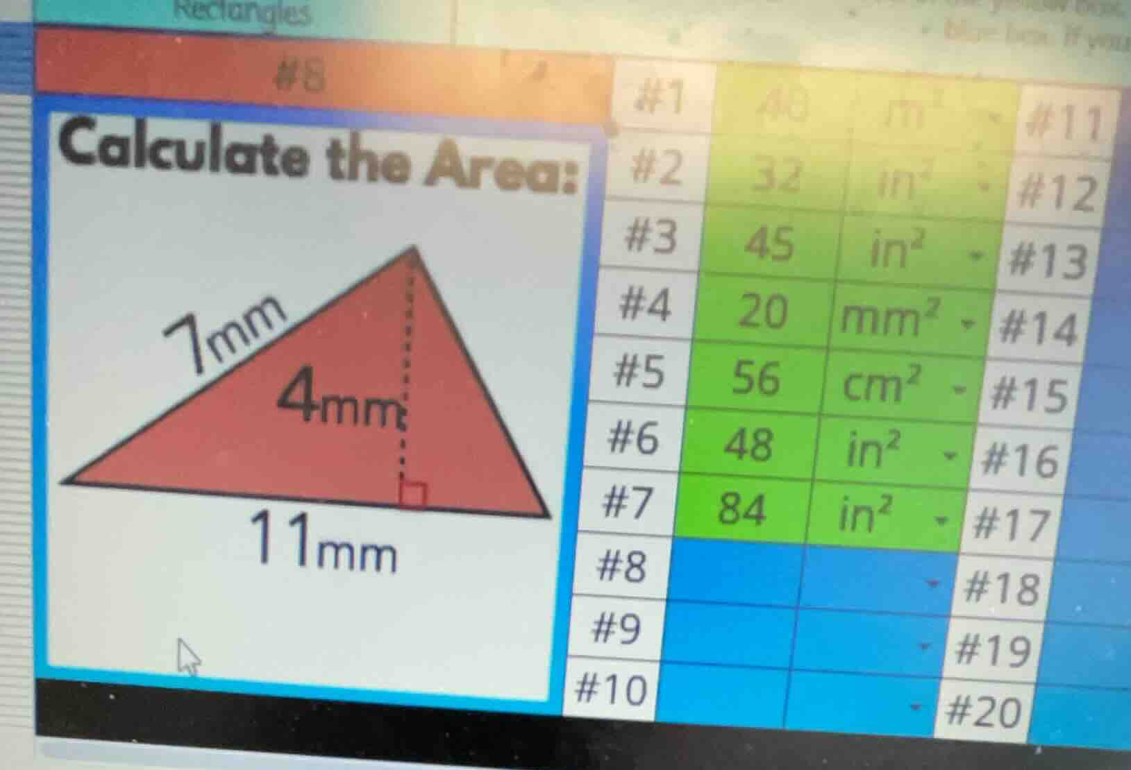 calculate the area: triangle with base 11mm, height 4mm, and one side 7…