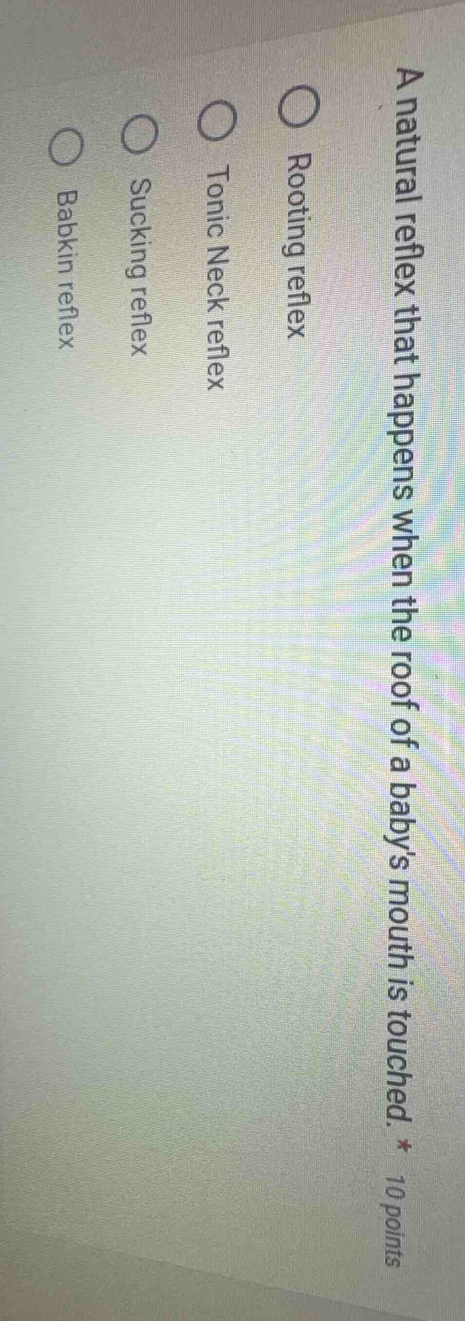 a natural reflex that happens when the roof of a babys mouth is touched…