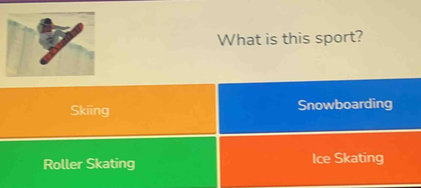 what is this sport? skiing snowboarding roller skating ice skating