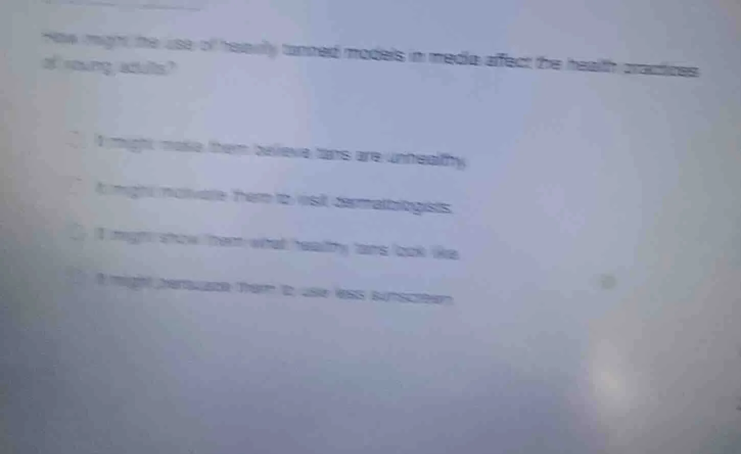 how might the use of heavily tanned models in media affect the health p…