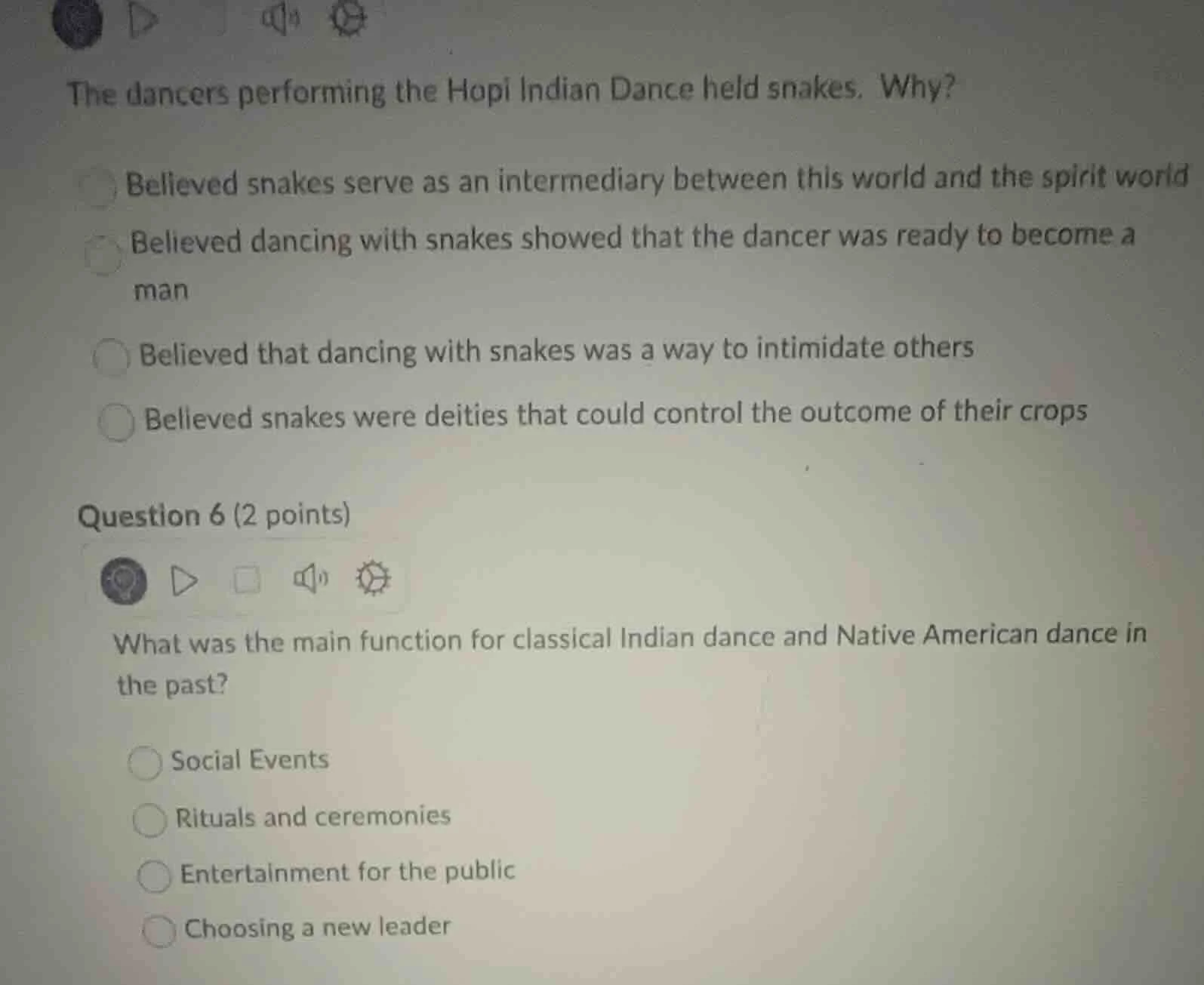 the dancers performing the hopi indian dance held snakes. why? believed…