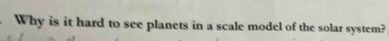 why is it hard to see planets in a scale model of the solar system?