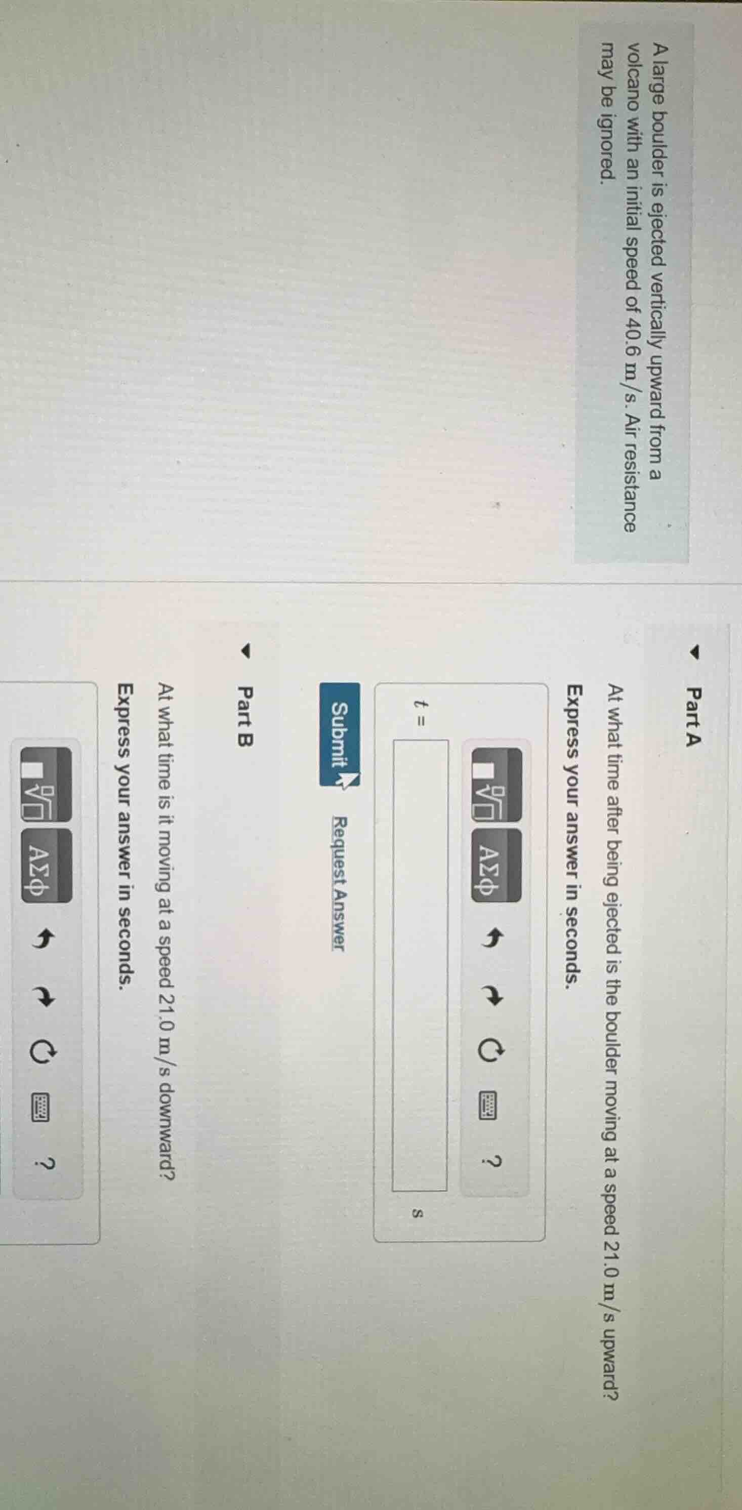 a large boulder is ejected vertically upward from a volcano with an ini…