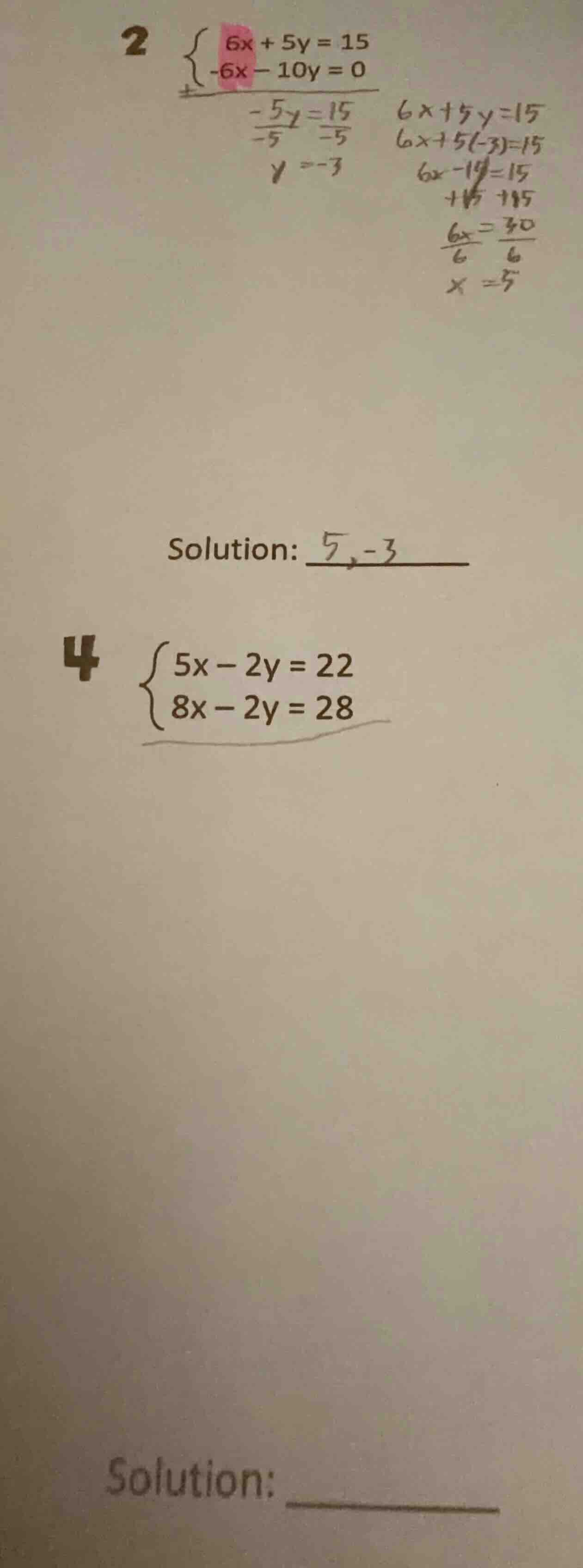 2 $\begin{cases} 6x + 5y = 15 \\ -6x - 10y = 0 end{cases}$$\frac{-5y}{-…