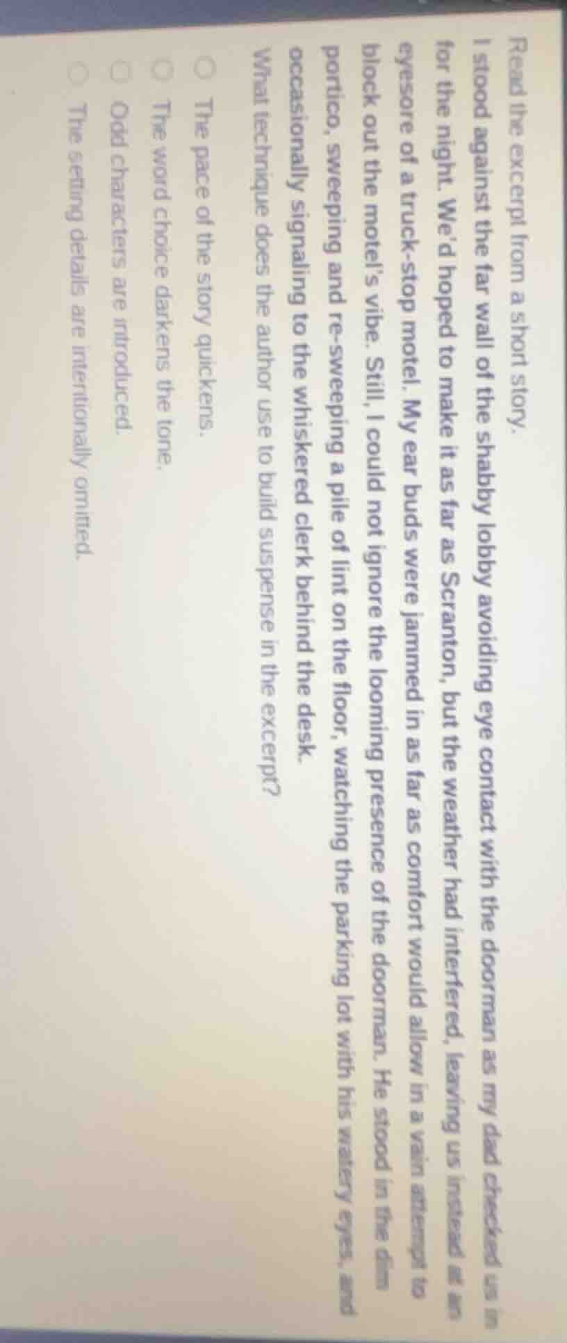 read the excerpt from a short story. i stood against the far wall of th…