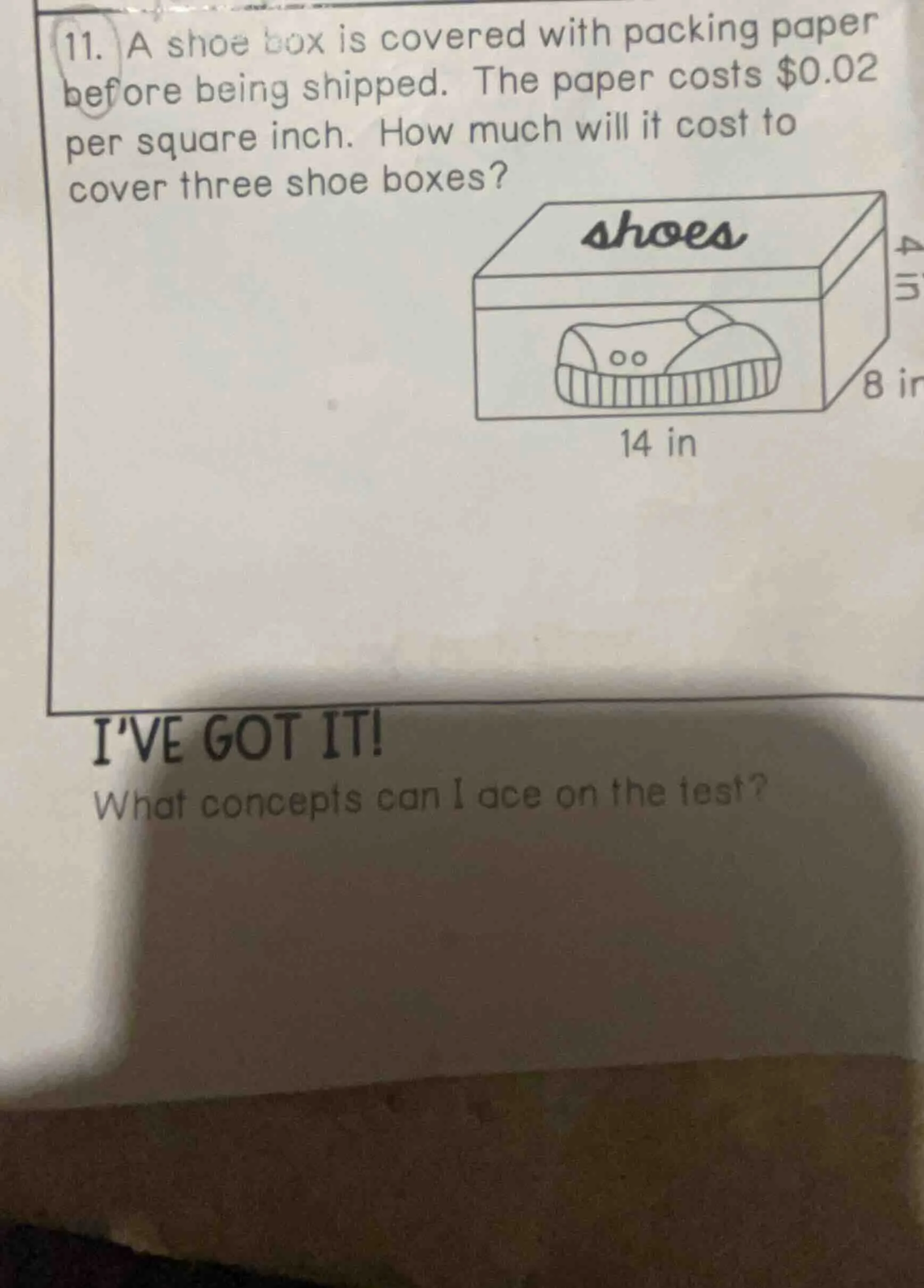 11. a shoe box is covered with packing paper before being shipped. the …