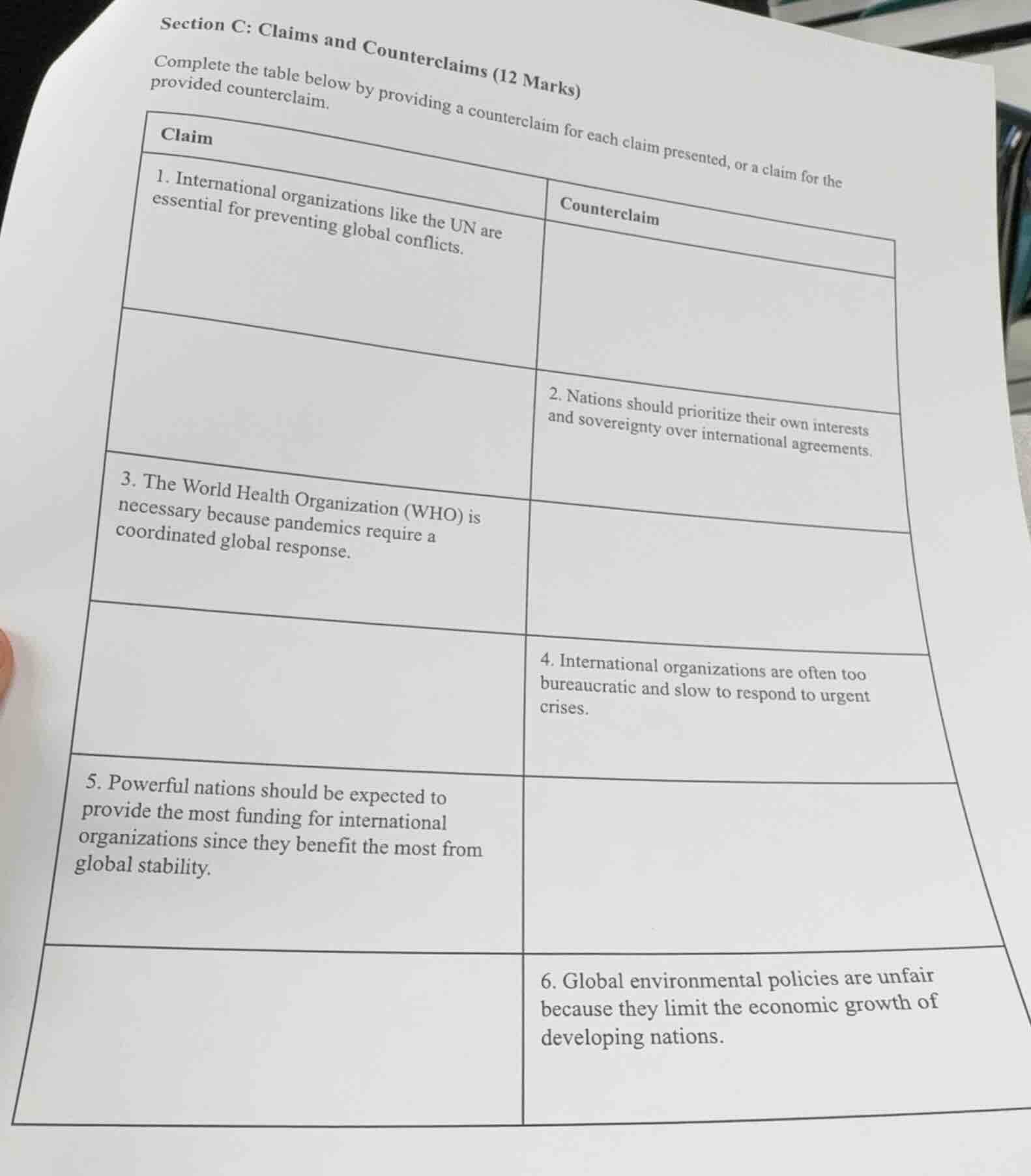 section c: claims and counterclaims (12 marks) complete the table below…