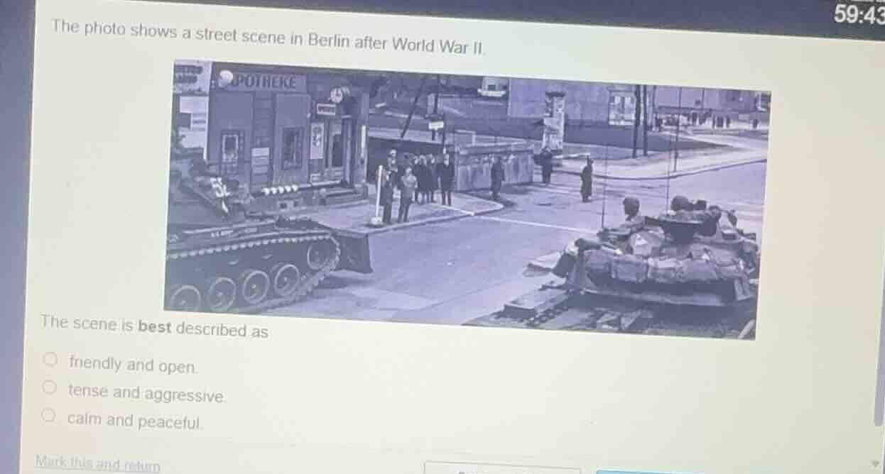 the photo shows a street scene in berlin after world war ii. the scene …