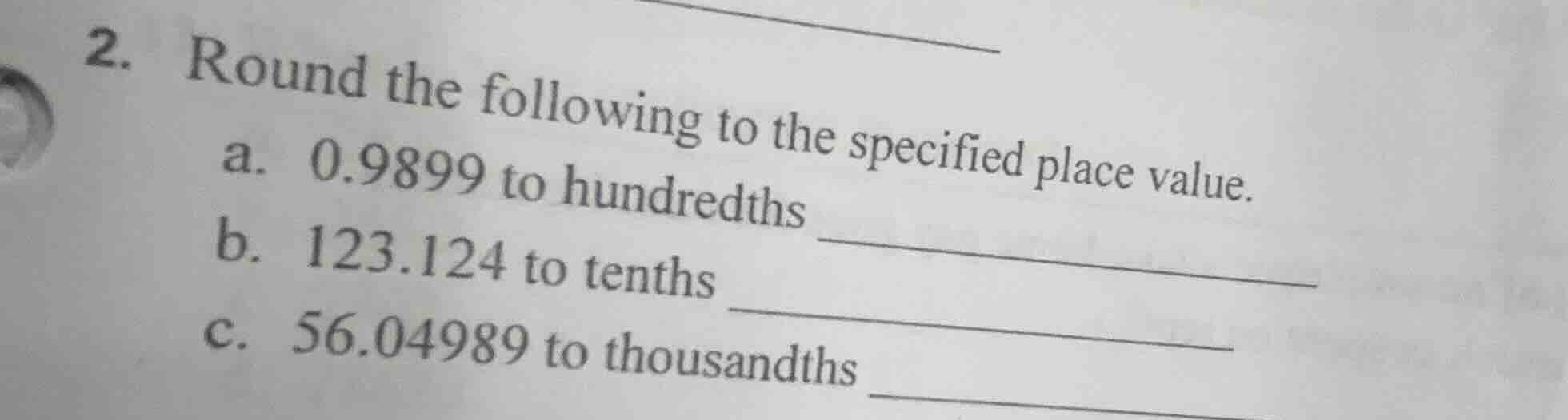 2. round the following to the specified place value. a. 0.9899 to hundr…