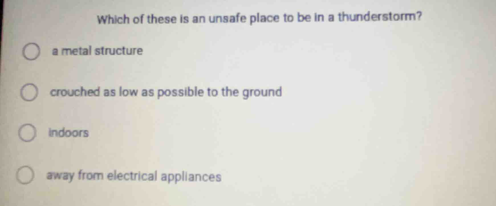 which of these is an unsafe place to be in a thunderstorm? a metal stru…