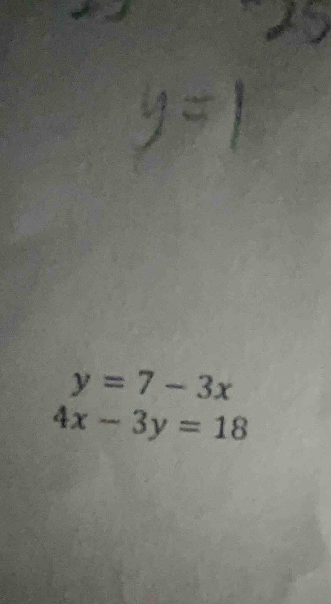 \\ \\begin{aligned} y &= 7 - 3x \\\\ 4x - 3y &= 18 \\end{aligned} \\