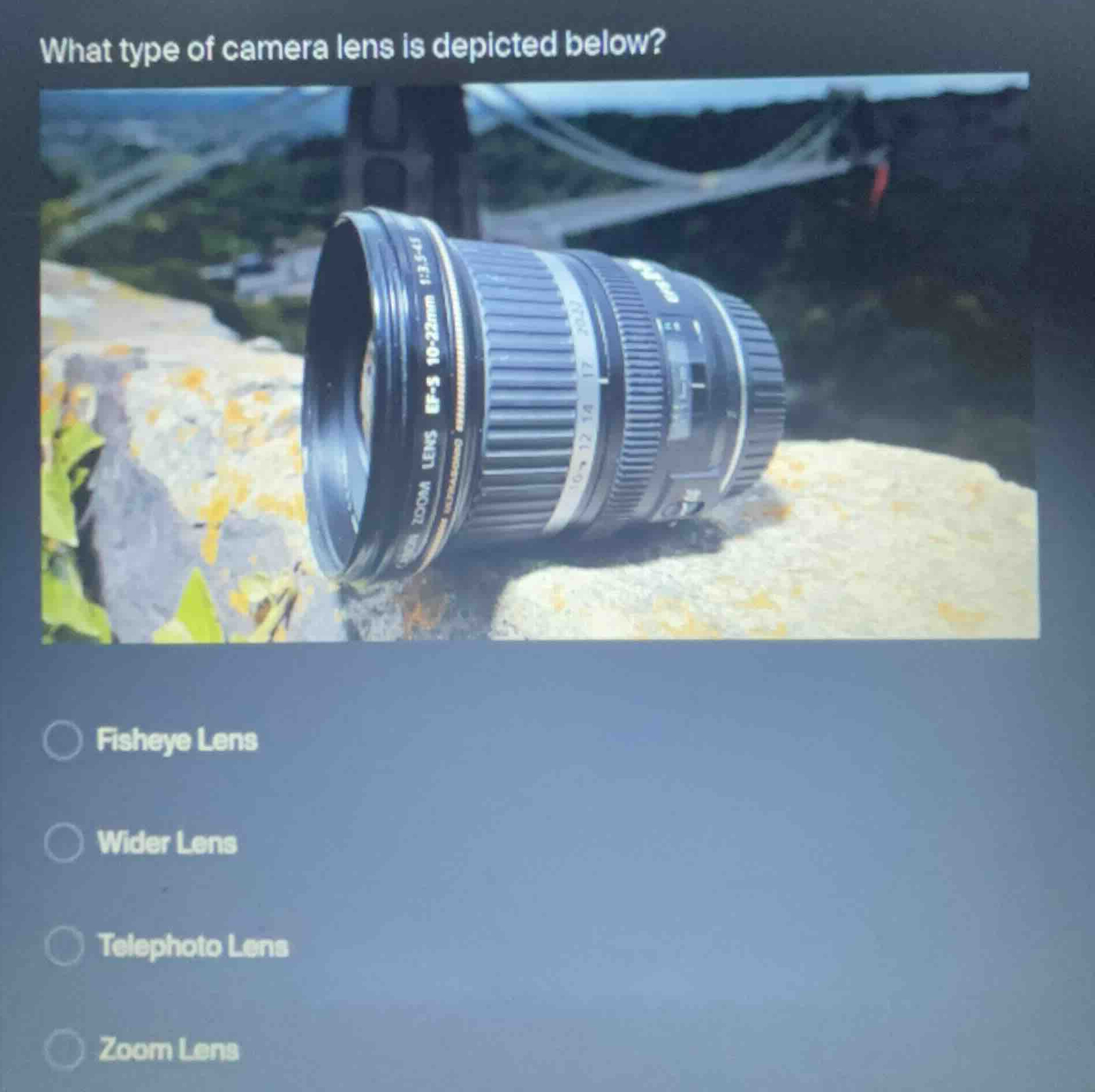 what type of camera lens is depicted below? fisheye lens wider lens tel…